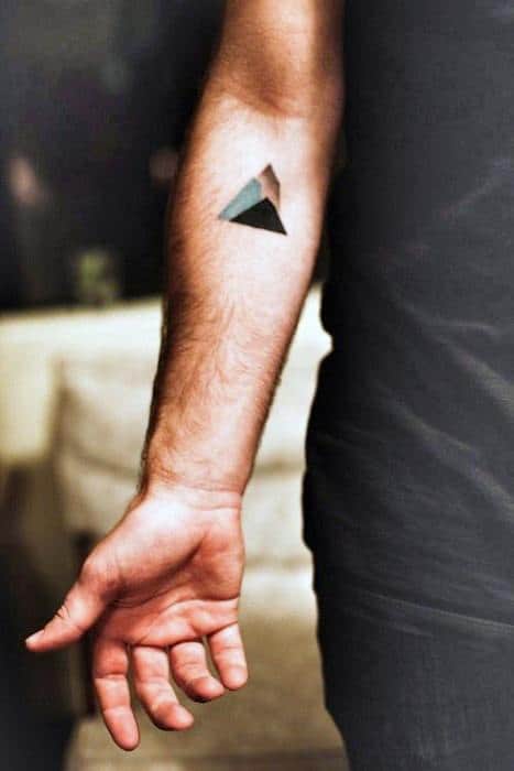 geometric mountain tattoo on arm