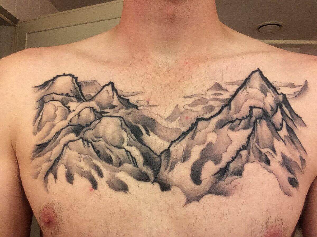 mountain chest tattoo