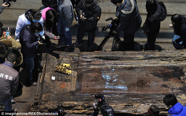 Gold plates and coins among valuable haul unearthed by archaeologists at 2,000-year-old royal tombs in China