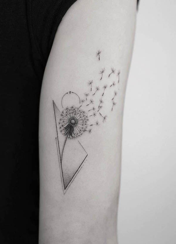 Blown dandelion arm tattoo by @jk.tattoo