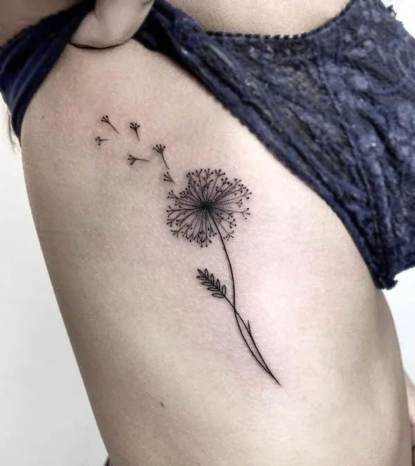 Dandelion rib tattoo by @mechainktattoostudio