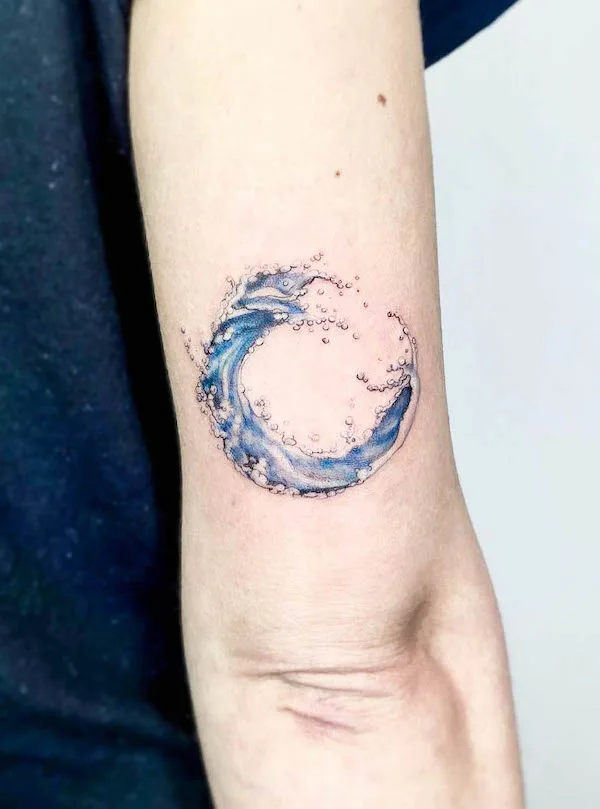 Waves in circle tattoo by @noemesystattoo