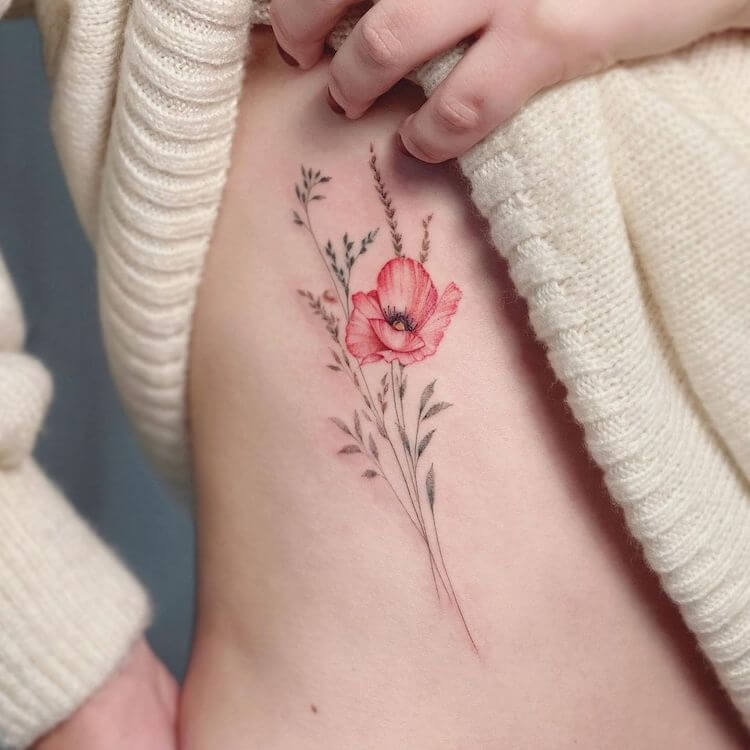 feminine poppy flower tattoo