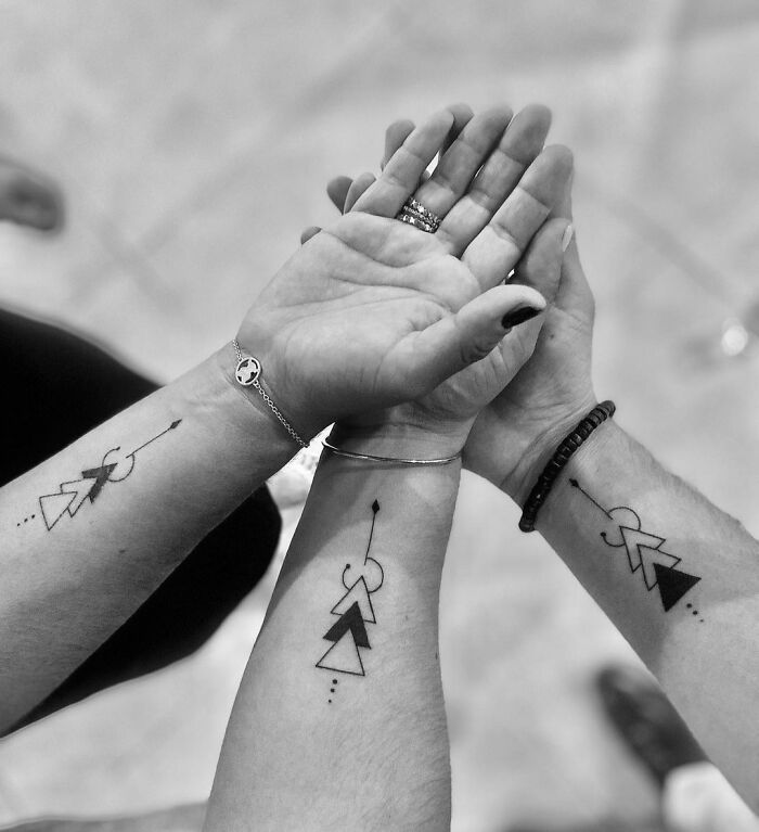 Matching wrist tattoos