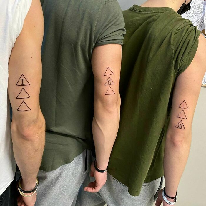 Triangle matching elbow tattoos