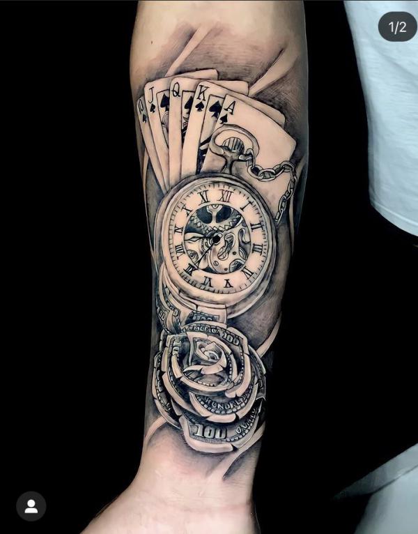 Playing cards and money rose with pocket watch tattoo