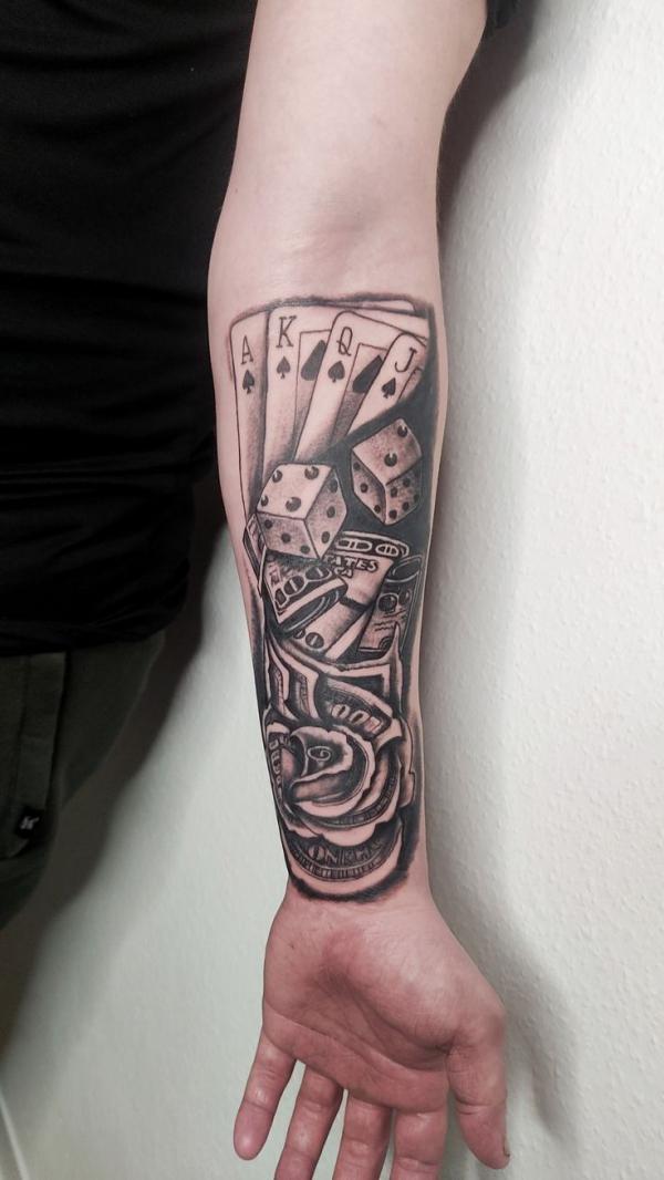 spade playing cards with dice and money rose tattoo forearm