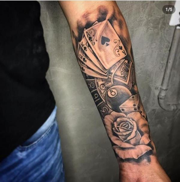 spade playing cards with dice money and rose tattoo forearm